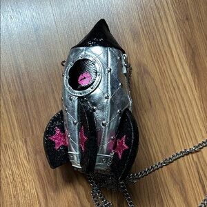 Betsey Johnson Silver and Black Rocket-Shaped Bag with Pink Stars